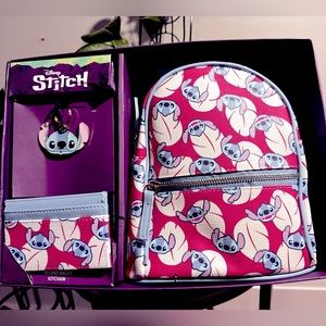 Stitch 3-piece set. NWT.
Keychain 
ID card wallet 
Mini Backpack.